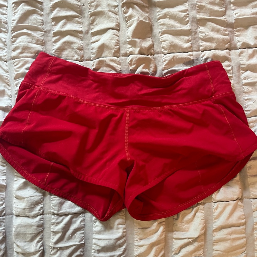 Size 6 red lululemon speed up shorts